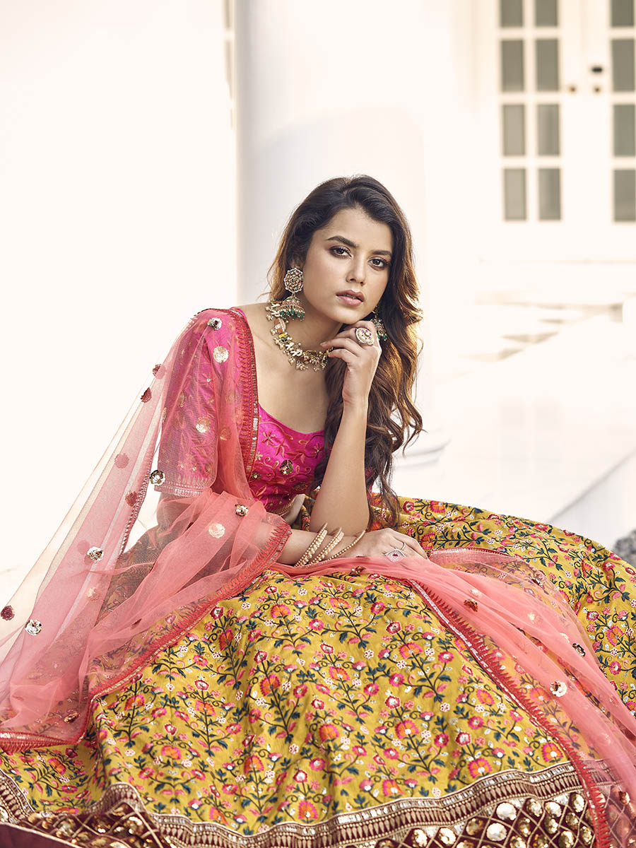 Myra Mustard Yellow and Rani Pink Art Silk Heavy Embroidered Lehenga
