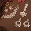 Tehzeeb Creations Fashionable Gold Necklace Earrings With Tikka Studded With Kundan And Pearl