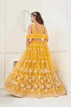 Aastha Fashion Mustard Yellow Butterfly Net White Cotton Thread Work And Sequence Work Embroidery Wedding Wear Lehenga Choli