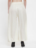 TAG 7 Women Off-White Solid Flared Palazzos