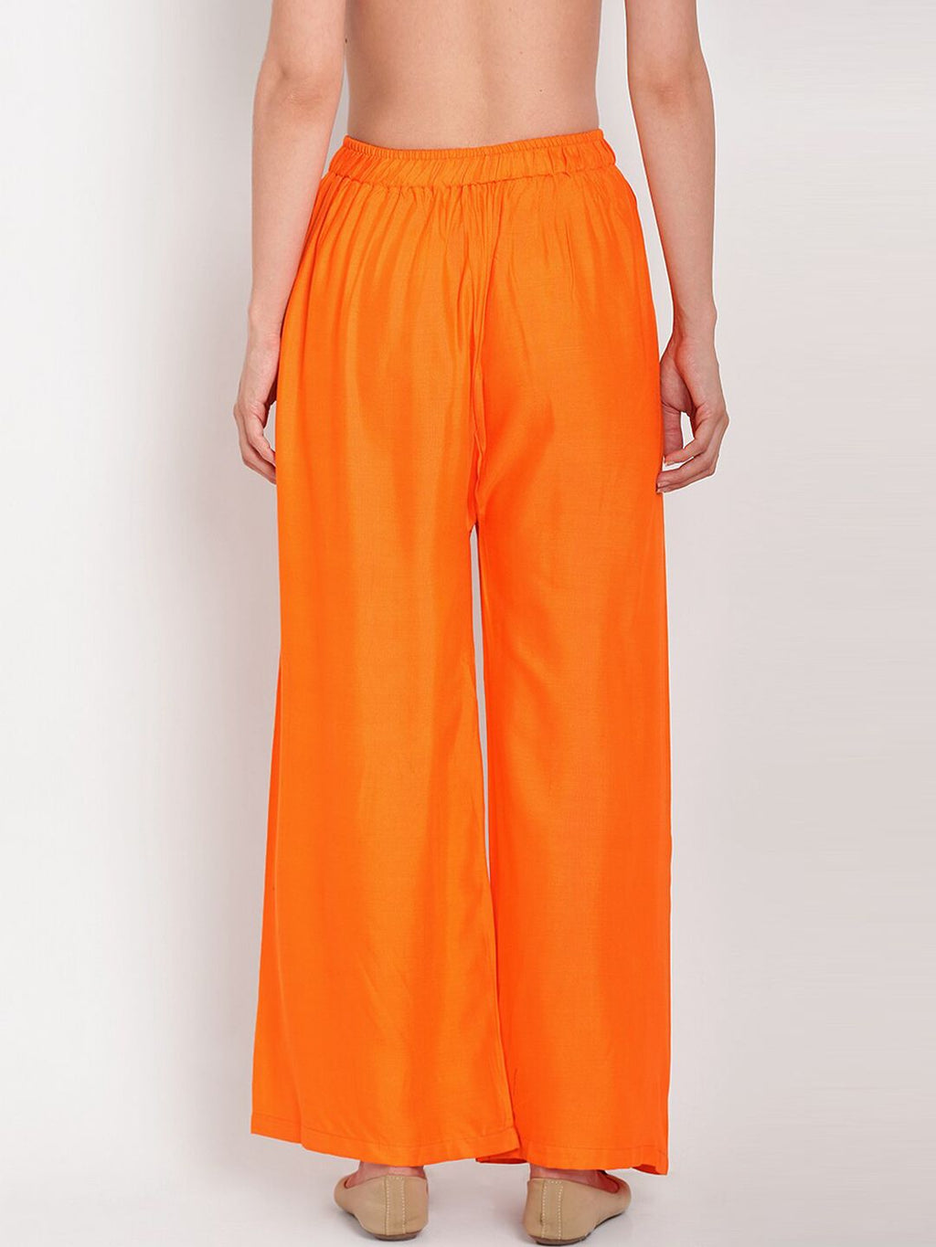 TAG 7 Women Orange Solid Flared Palazzos