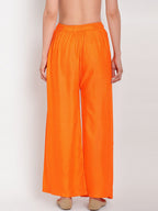 TAG 7 Women Orange Solid Flared Palazzos