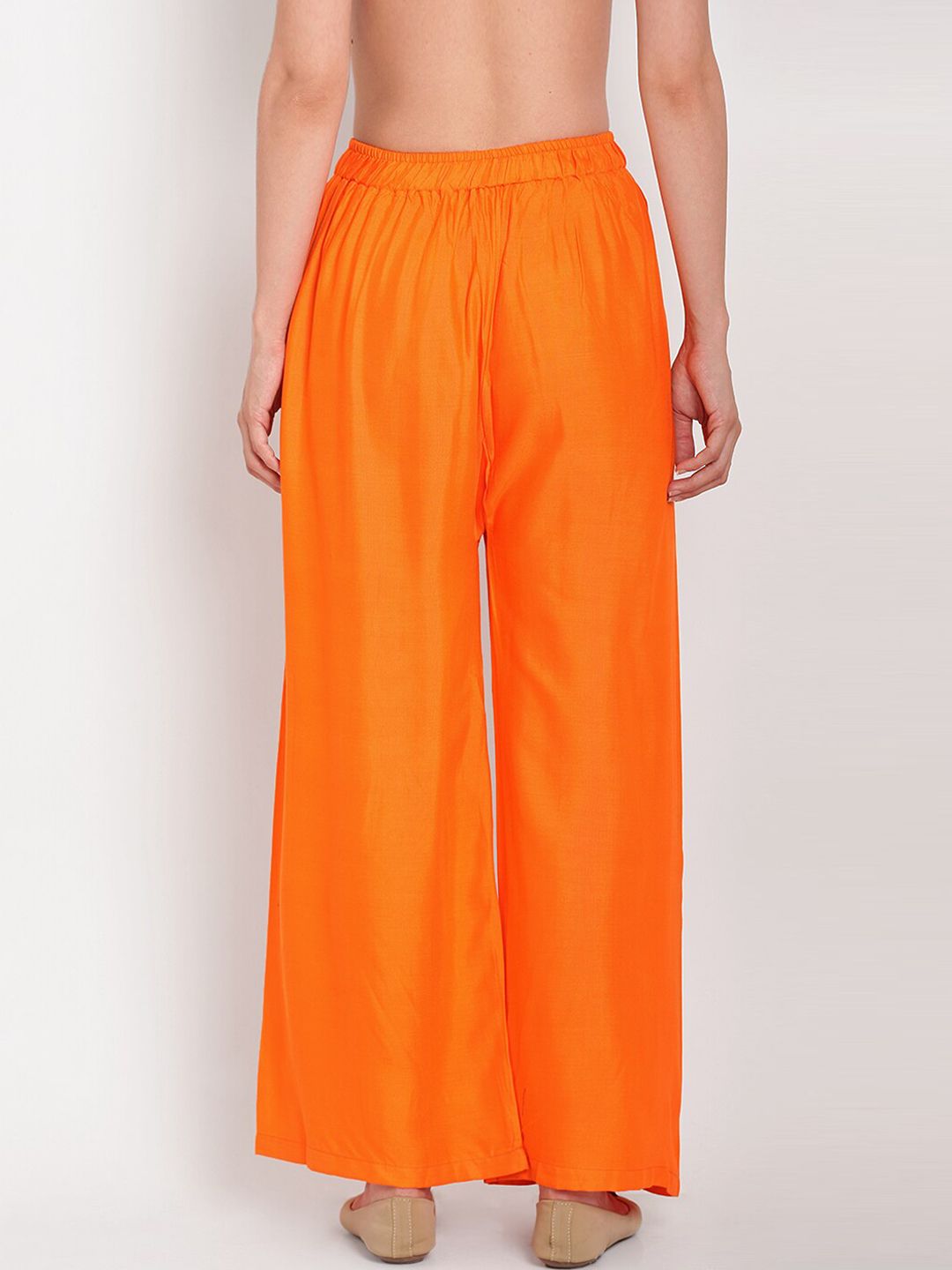TAG 7 Women Orange Solid Flared Palazzos