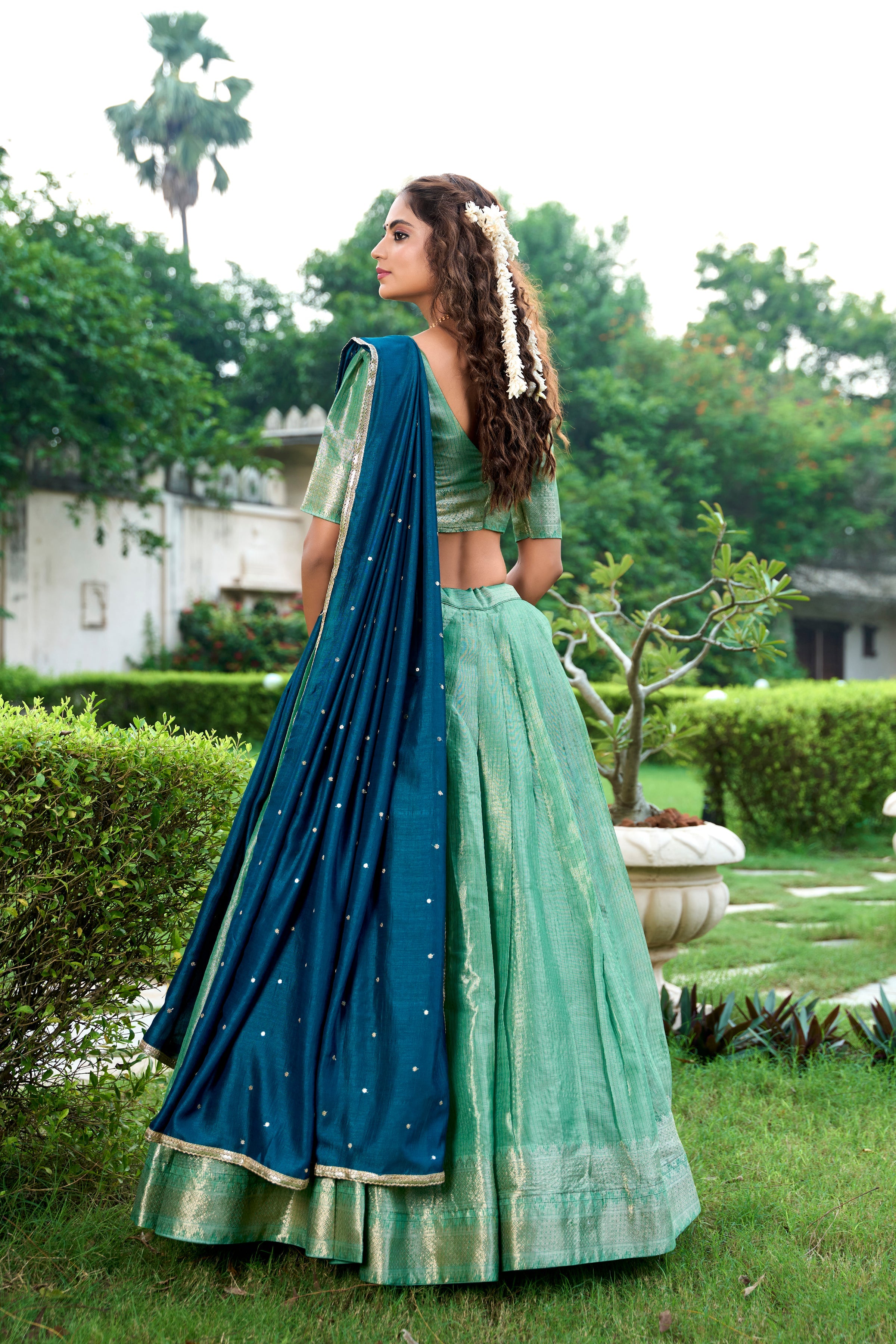 Lorenvalley Pista Kanchipuram Zari Weaving Work Lehenga Choli with Dupatta