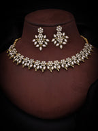 Tehzeeb Creations White Colour Gold Pleated Stone Studded Necklace With Earrings