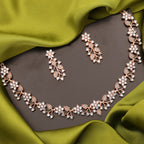 Tehzeeb Creations Rose Gold Pleated White Diamond With Gray Beads Necklace Set