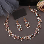 Tehzeeb Creations Rose Gold Pleated White Diamond With Sky Blue Beads Necklace Set