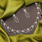 Tehzeeb Creations Silver Pleated White Diamond With Orange Beads Necklace Set