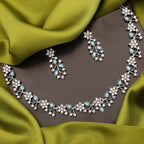 Tehzeeb Creations Silver Pleated White Diamond With Sky Blue Beads Necklace Set