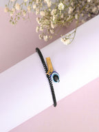 NVR Women & Men Black Evil Eye Spring Ring Rakhi With Roli Chawal - Distacart
