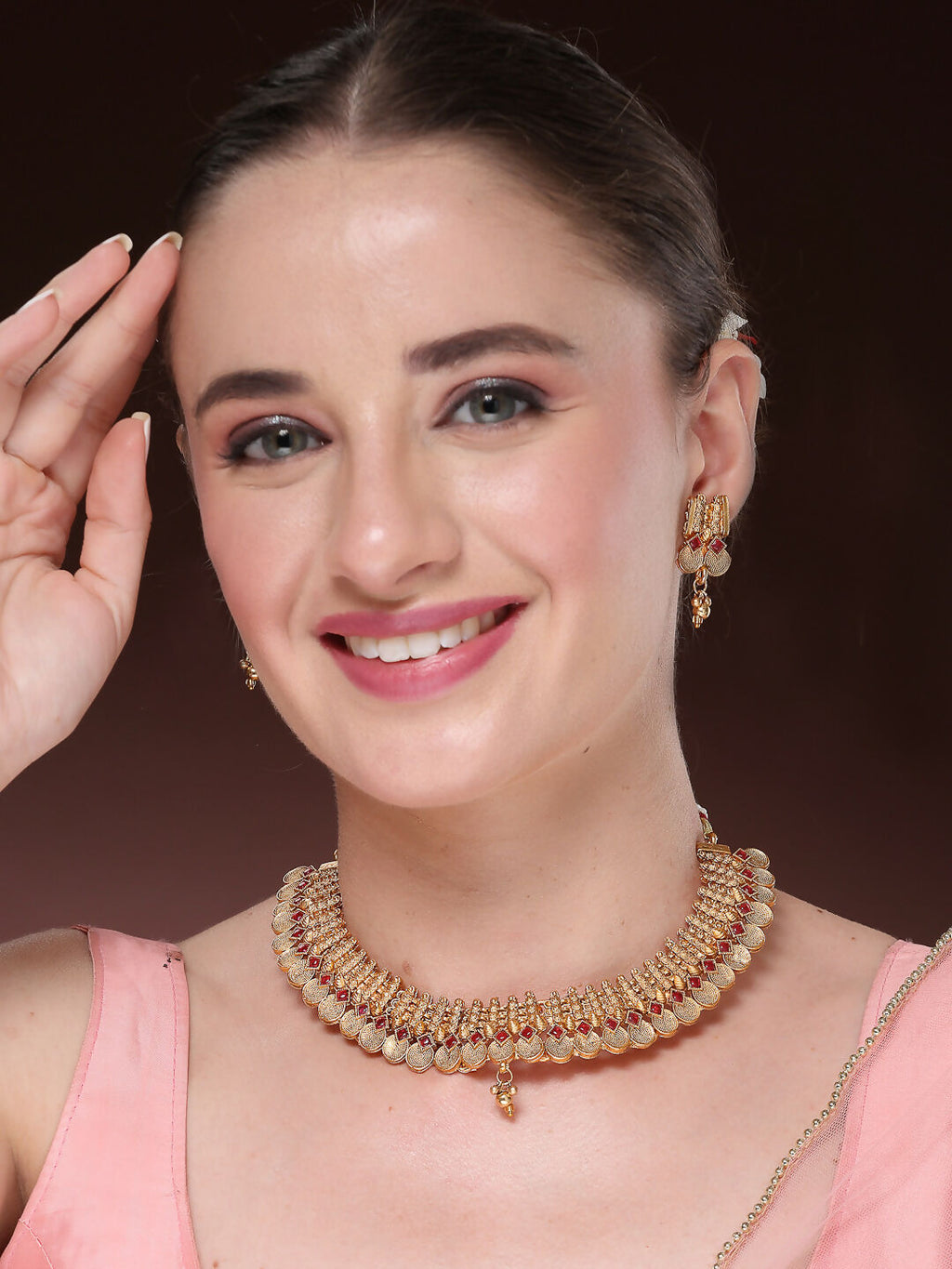 NVR Women Gold-Polished Pink Stone Studded Handcrafted Temple Jewellery Set