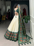 Lorenvalley Offwhite and Green Tussar Silk Patola Print Lehenga Choli