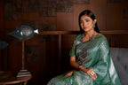 Vardha Teal Green Silver Zari Kanjeevaram Silk Saree