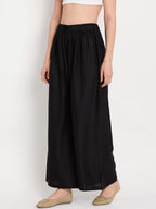 TAG 7 Women Black Solid Flared Palazzos