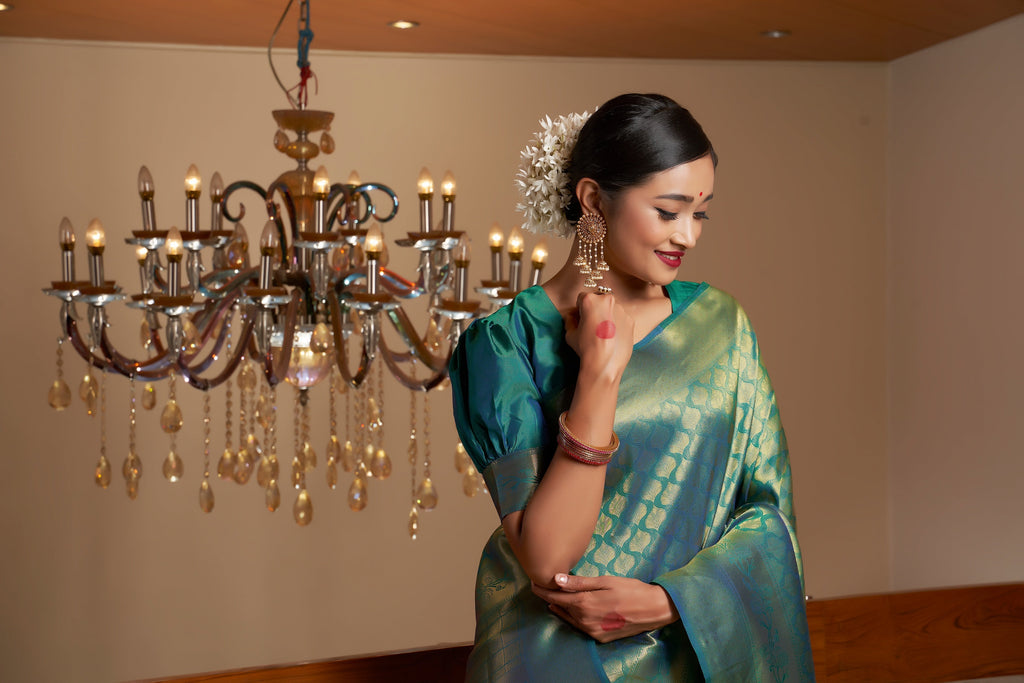 Vardha Pine Green Golden Zari Kanjeevaram Silk Saree