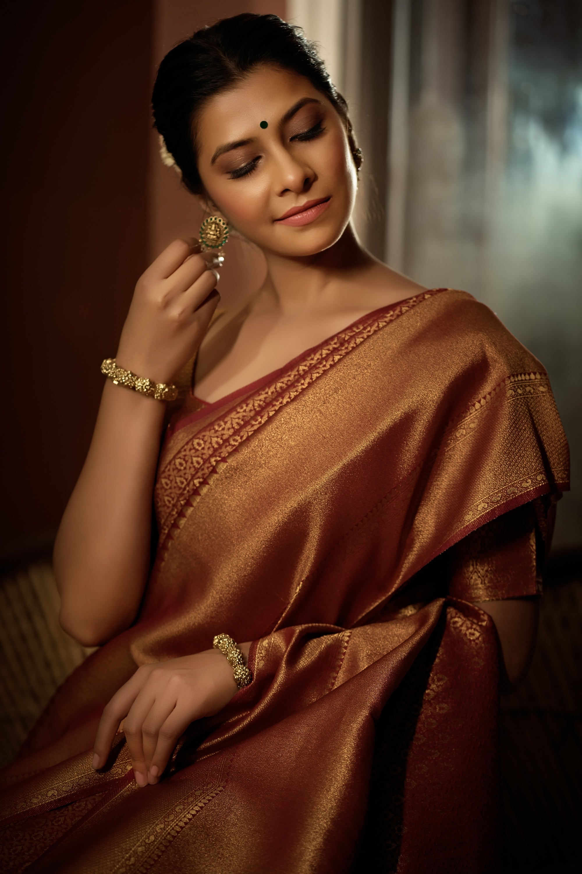 Vardha Rosewood Maroon Golden Zari Kanjeevaram Silk Saree