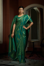 Vardha Teal Green Golden Zari Kanjeevaram Silk Saree