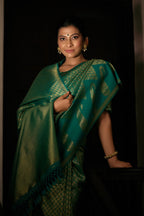 Vardha Teal Green Golden Zari Kanjeevaram Silk Saree