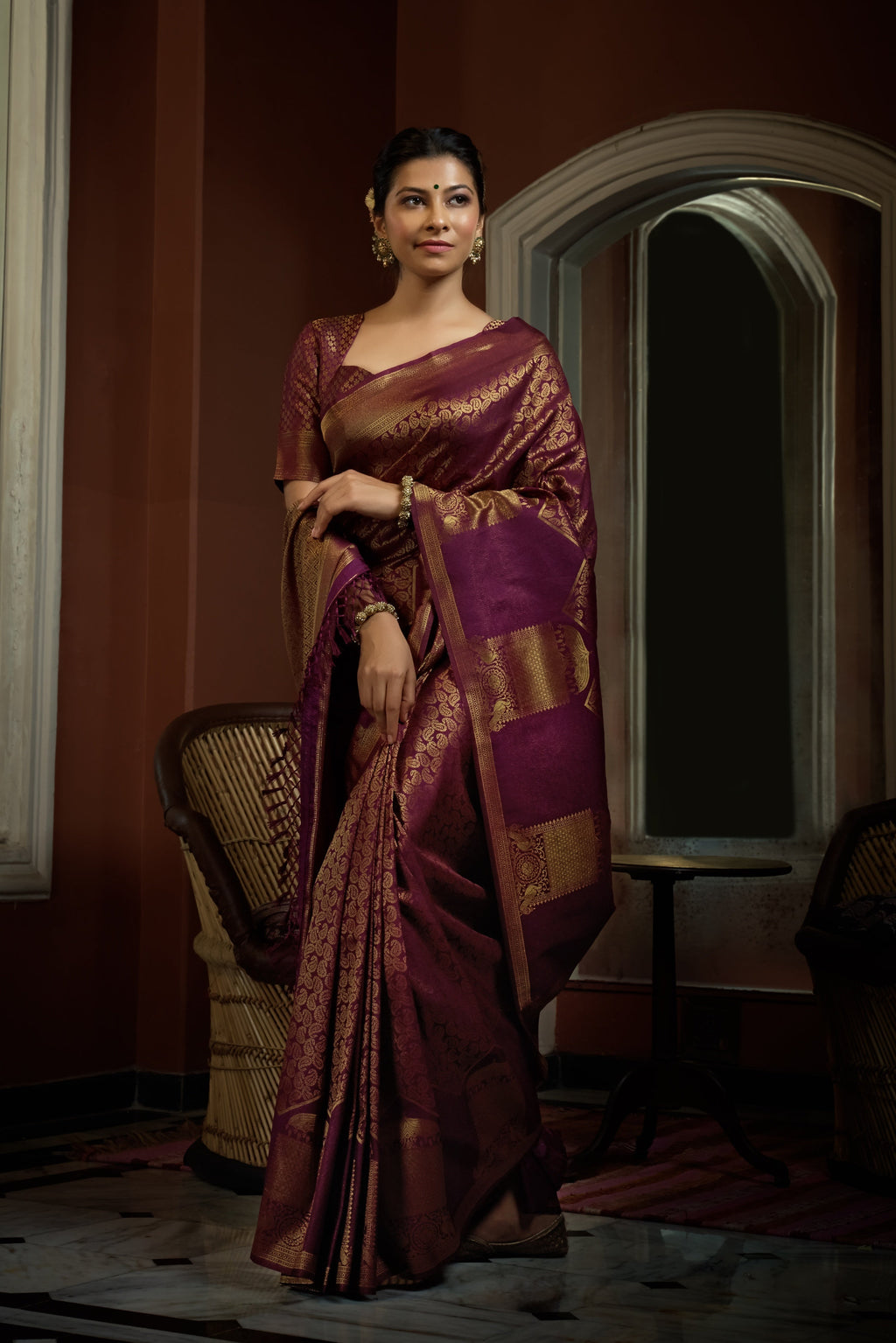 Vardha Tyrian Wine Golden Zari Kanjeevaram Silk Saree