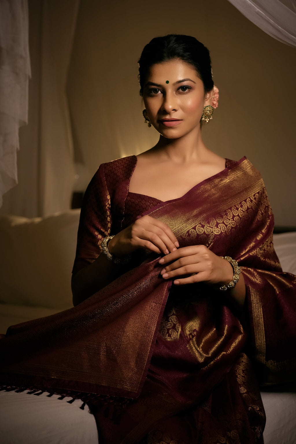 Vardha Tyrian Wine Golden Zari Kanjeevaram Silk Saree