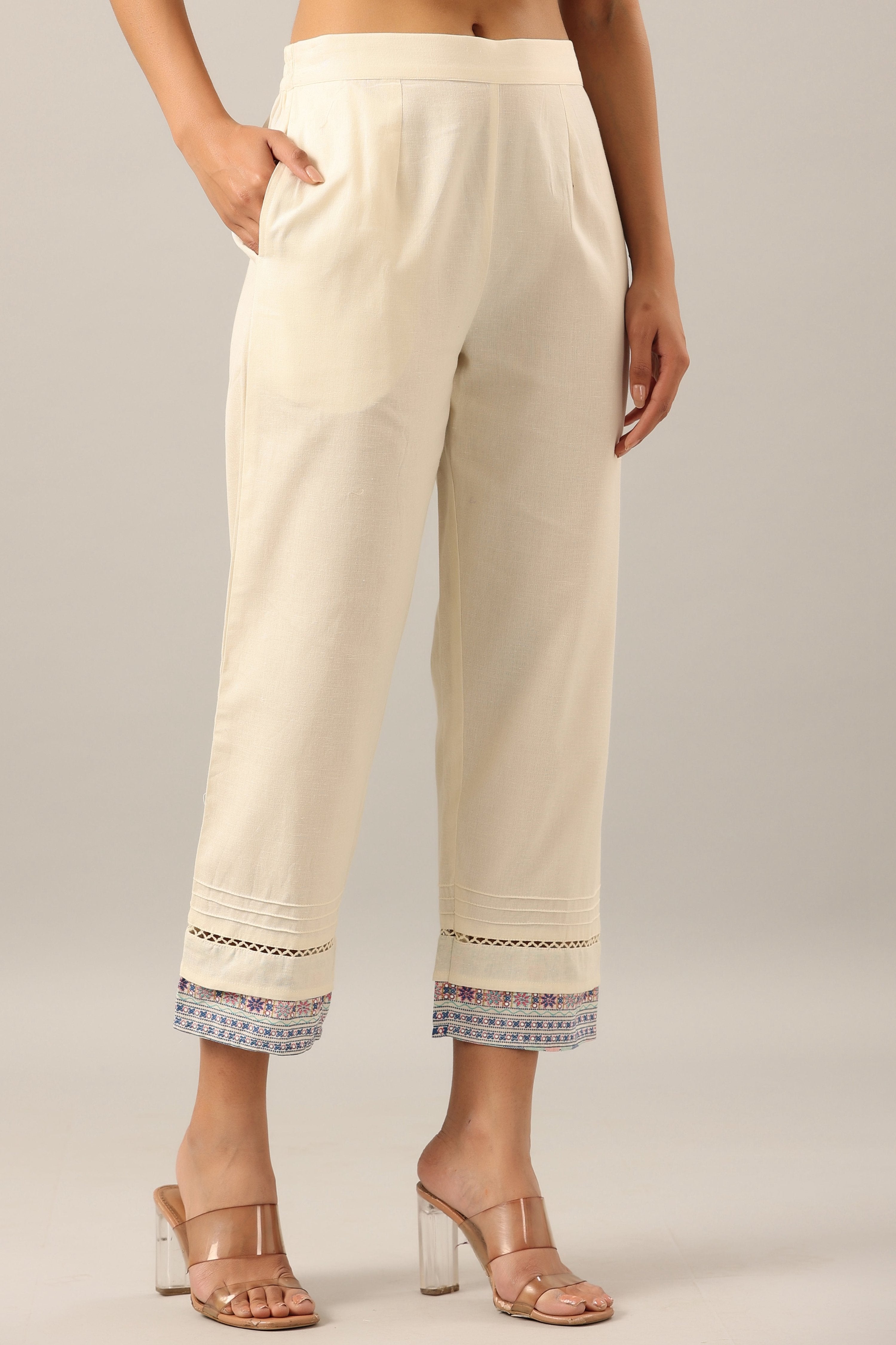 Juniper Women's Off-White Solid Cotton Flex Pants With Printed Hem, Pintucks & Lace Work