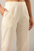 Juniper Women's Off-White Solid Cotton Flex Pants With Printed Hem, Pintucks & Lace Work
