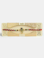 NVR Men Gold-Toned Peacock Design Stone-Studdded Rakhi With Roli Chawal & Chocolate - Distacart