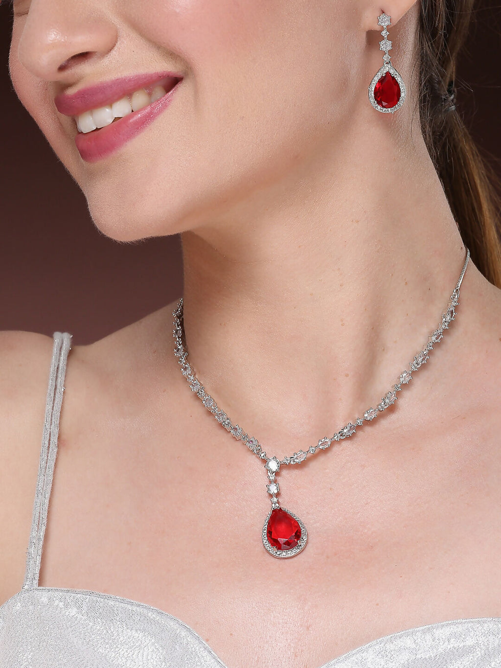 NVR Women's Silver-Plated Red American Diamond-Studded Handcrafted Jewellery Set