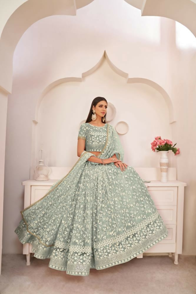 Aastha Fashion Turquoise Green Butterfly Net White Cotton Thread Work, Zari Work And Sandwich Sequence Work Embroidery Wedding Wear Lehenga Choli