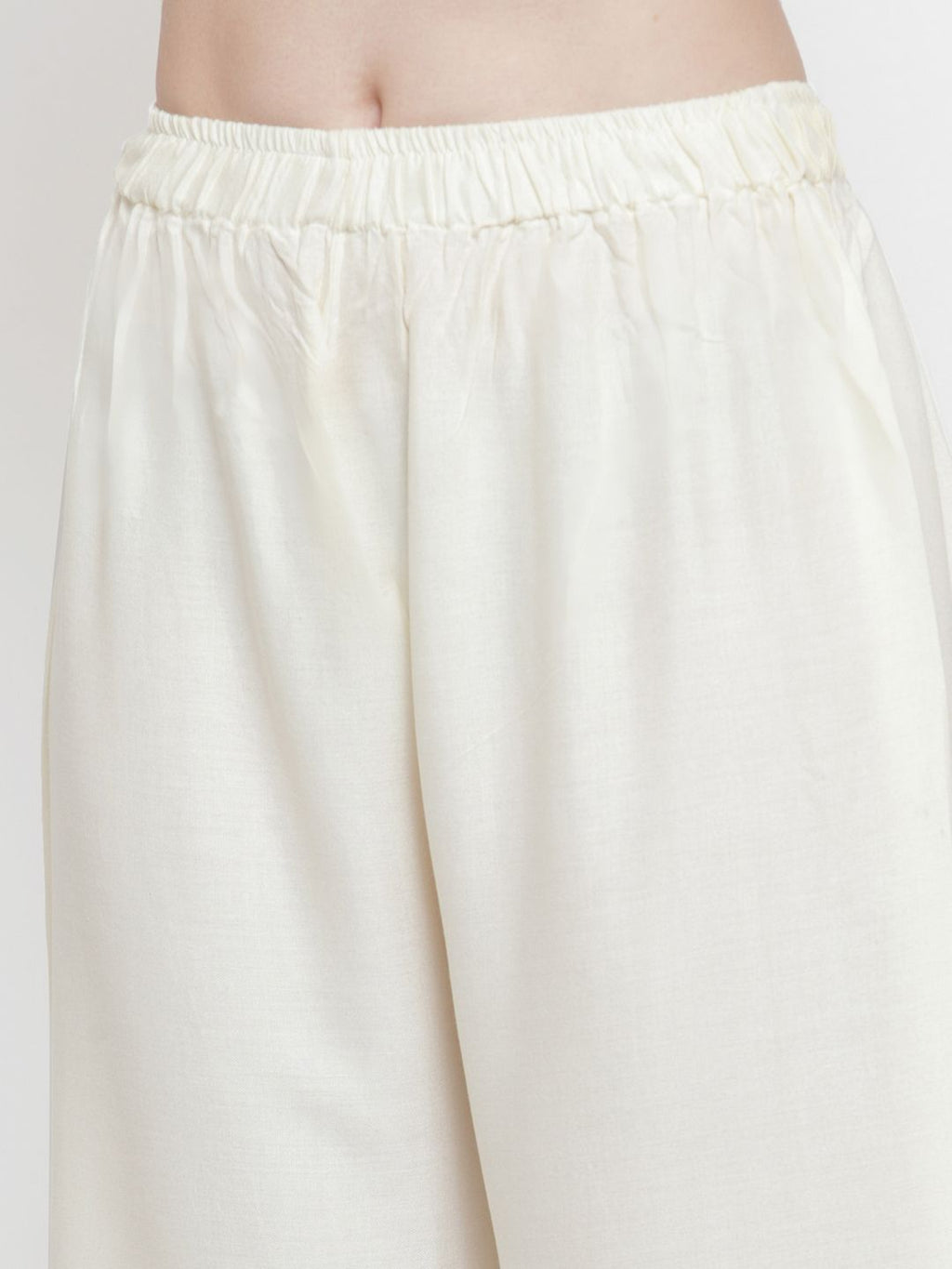 TAG 7 Women Off-White Solid Flared Palazzos