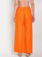 TAG 7 Women Orange Solid Flared Palazzos