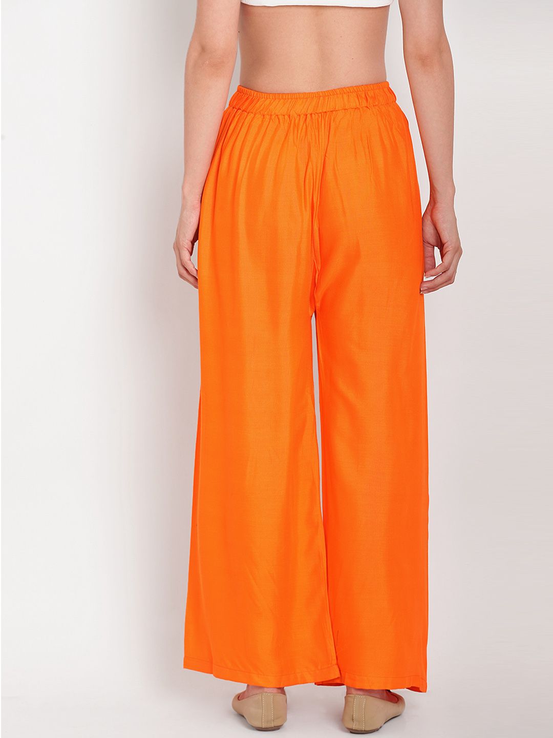 TAG 7 Women Orange Solid Flared Palazzos
