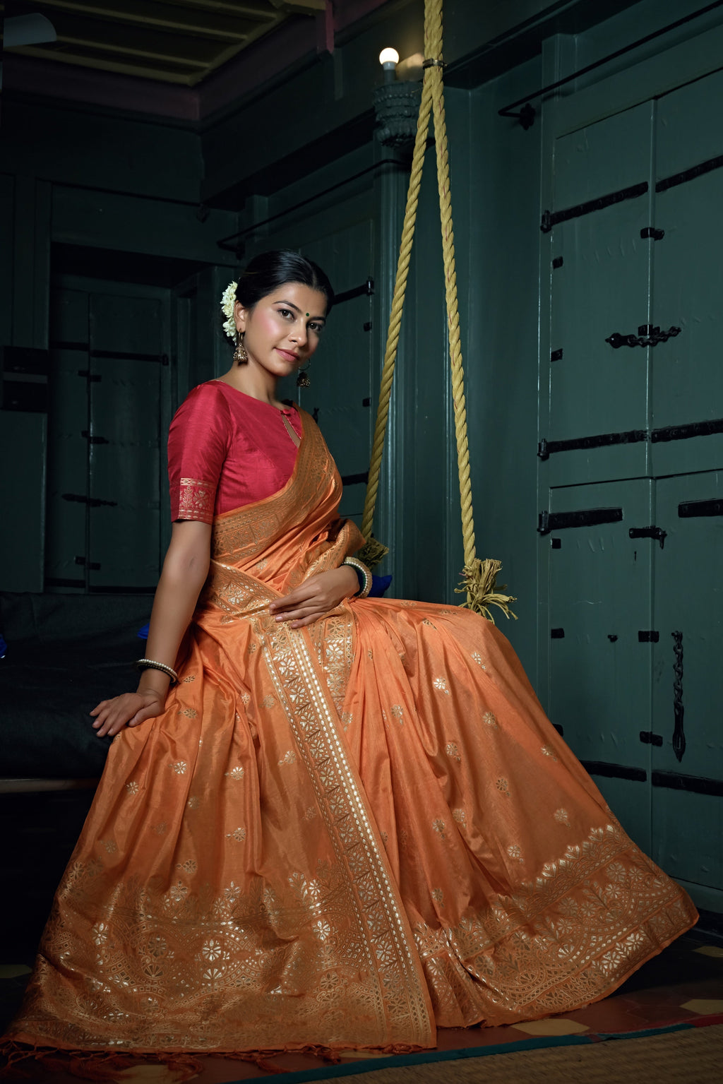Vardha Coral Orange Golden Zari Banarasi Silk Saree