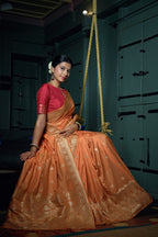 Vardha Coral Orange Golden Zari Banarasi Silk Saree