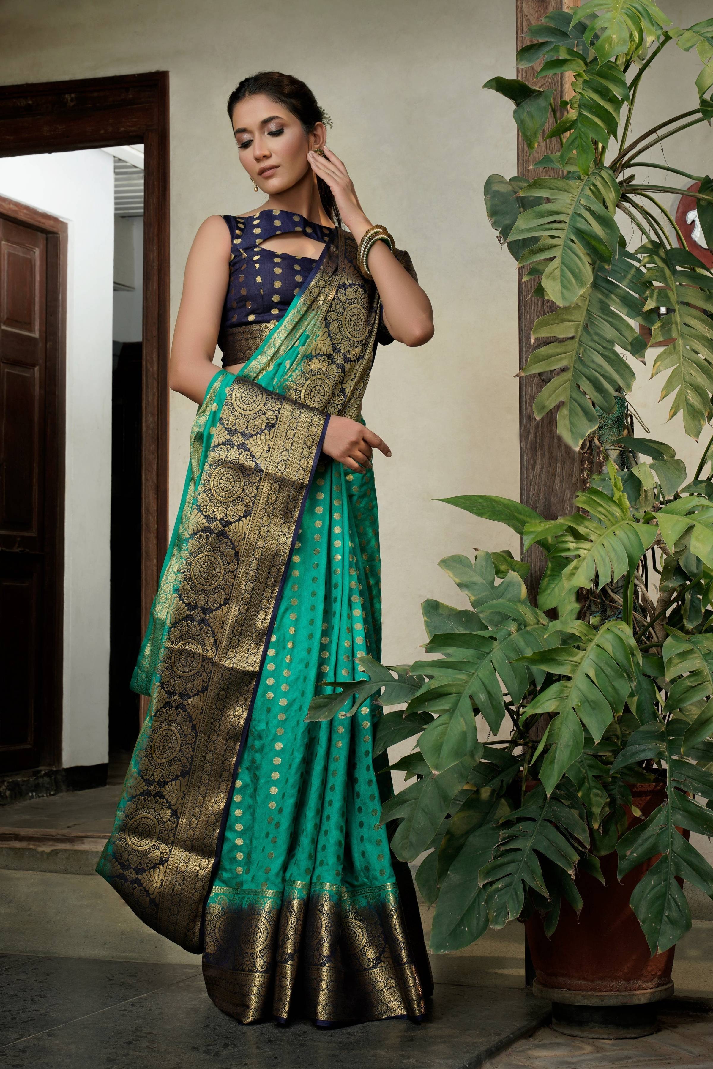 Vardha Teal Green Golden Zari Banarasi Raw Silk Saree