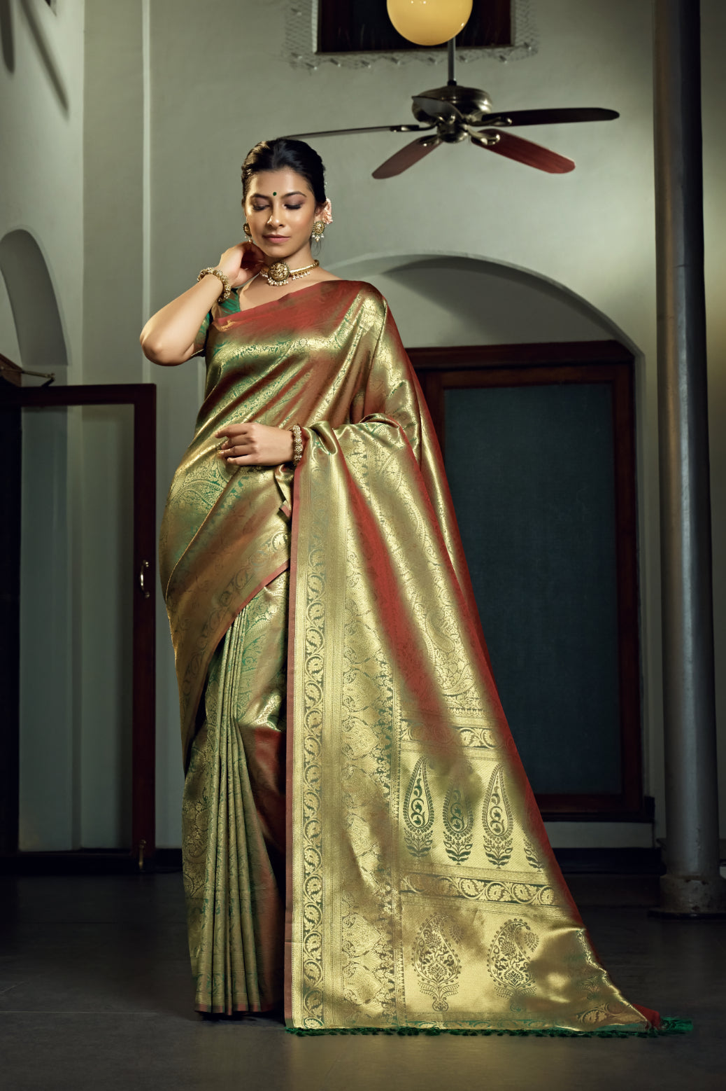 Vardha Olive Green Zari Work Kanjeevaram Silk Saree