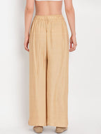 TAG 7 Women Beige Solid Flared Palazzos