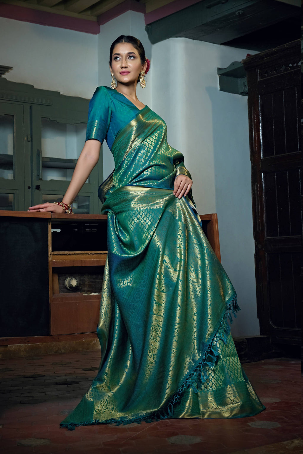 Vardha Teal Blue Golden Zari Kanjeevaram Silk Saree