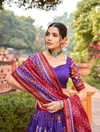 Vastranavya Patola Printed and Foil Work Tussar Silk Lehenga with Unstitched Blouse - Purple