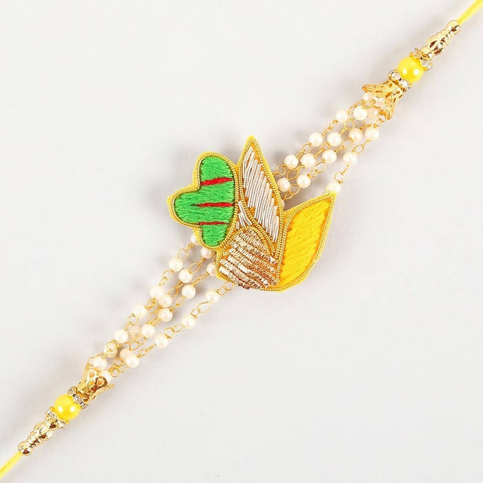 Meenakari Glimming Rakhi & Kaju Rolls Box - Distacart