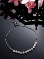 NVR Women Silver-Plated Handcrafted American Diamond Link Bracelet - Distacart