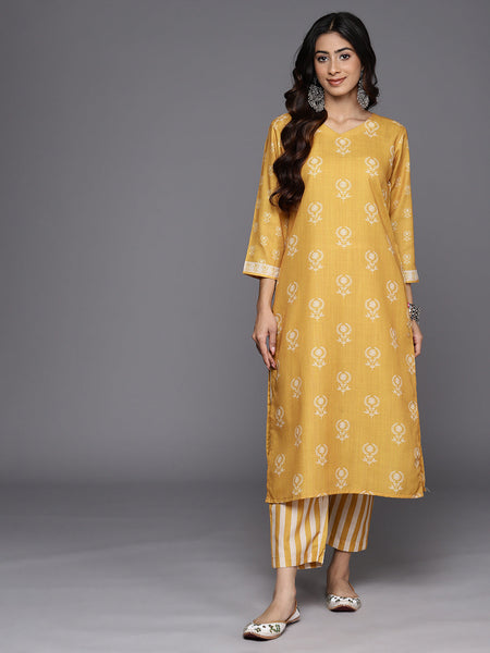 KSUT (House of Varanga) Mustard Digital Printed Kurta With V Neckline Paired With Straight Trouser