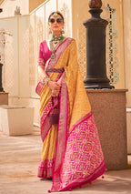 Monjolika Fashion Patola Silk Yellow And Rani Pink Patola Print Classic Saree