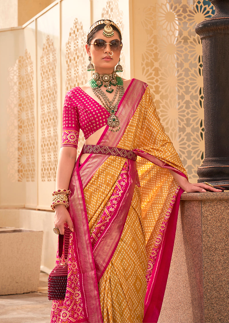 Monjolika Fashion Patola Silk Yellow And Rani Pink Patola Print Classic Saree