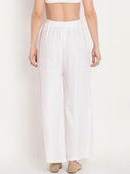 TAG 7 Women White Solid Flared Palazzos