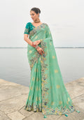 Monjolika Fashion Turquoise Viscose Tissue Silk Saree With Embroidery & Cutwork Border