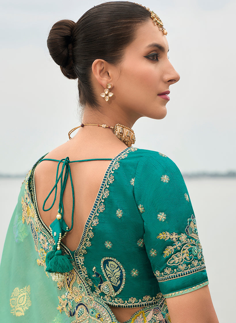 Monjolika Fashion Turquoise Viscose Tissue Silk Saree With Embroidery & Cutwork Border