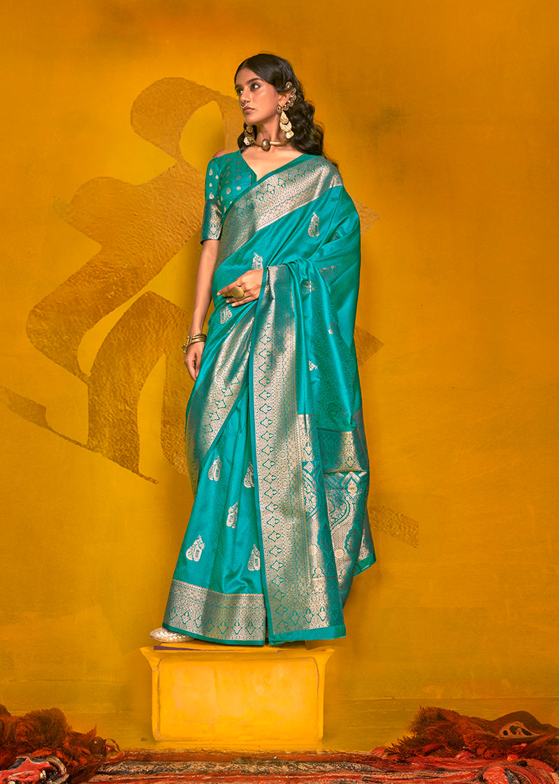 Monjolika Fashion Charming Cyan Color Silk Saree With Fine Zari Weave