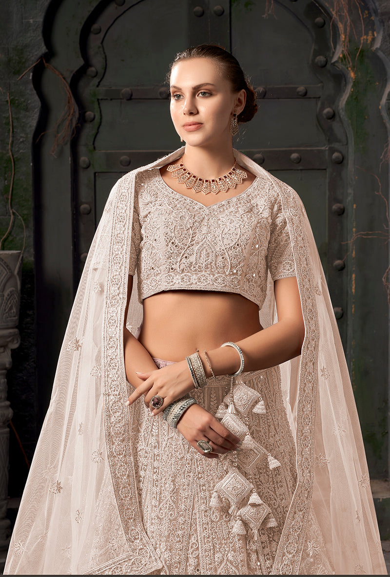 Monjolika Fashion Cream Net Lehenga Choli In Thread Embroidered