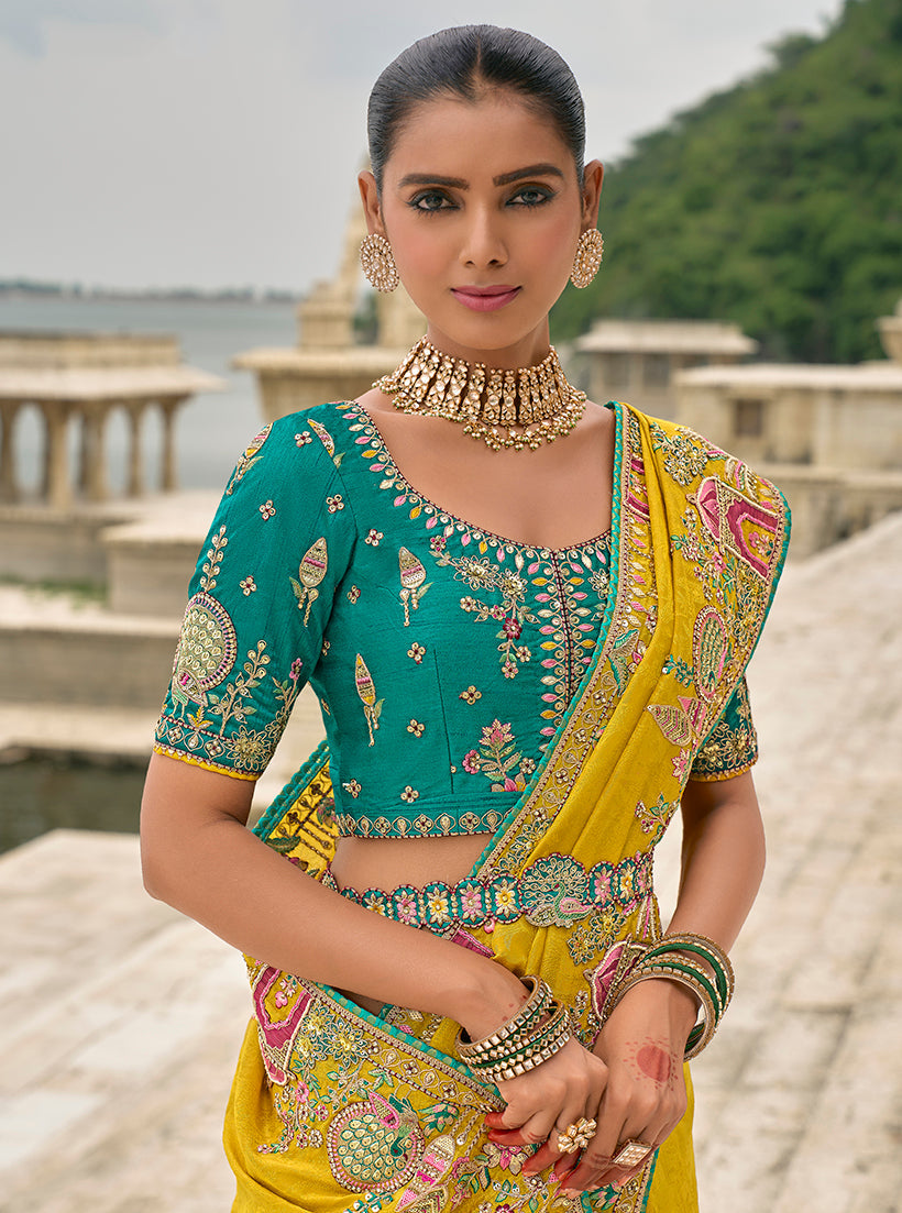 Monjolika Fashion Yellow Color Banarasi Silk Blend Embroidered With Heavy Patchwork Border Saree With Contrast Blouse